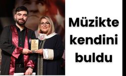 Müzikte kendini buldu