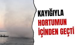 Kayığıyla hortumun içinden geçti