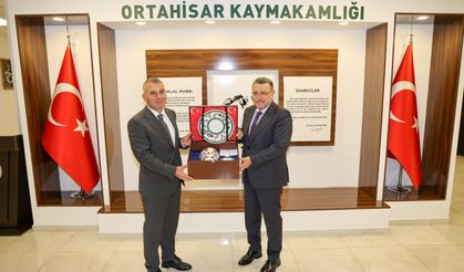 BAŞKAN GENÇ’TEN ORTAHİSAR KAYMAKAMI KOTAN’A HAYIRLI OLSUN ZİYARETİ